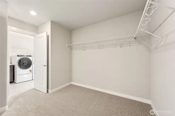 Showing similar sized closet (laundry room not connected in Violet plan - providing more storage in your closet)