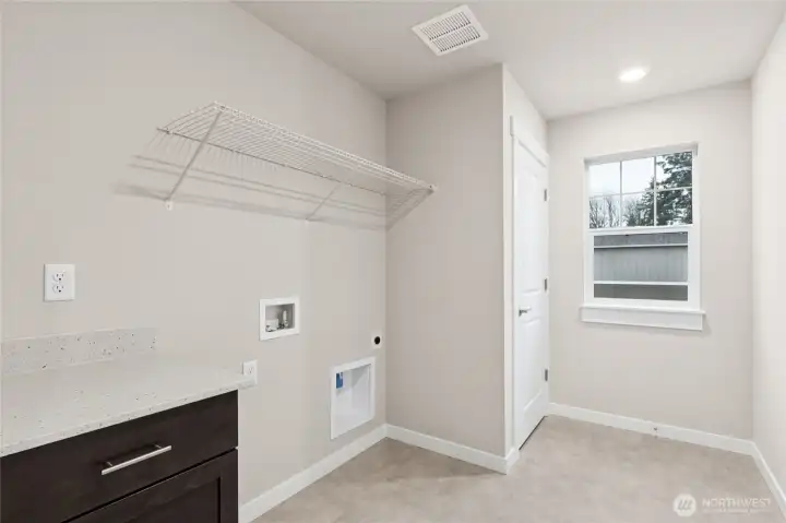 Laundry located on upper level.