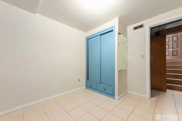 Downstairs bedroom with bath attached.