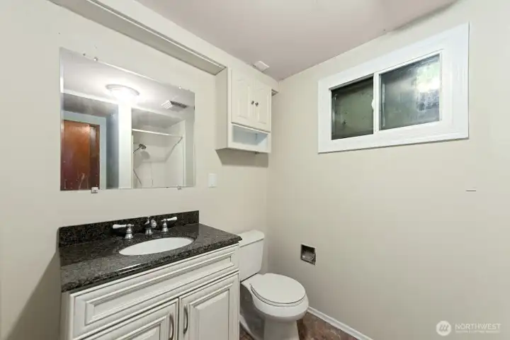 Downstairs bedroom with 3/4 bath attached.