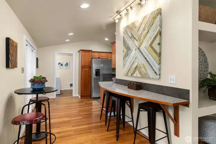 Nicely updated kitchen features both table space and breakfast bar.