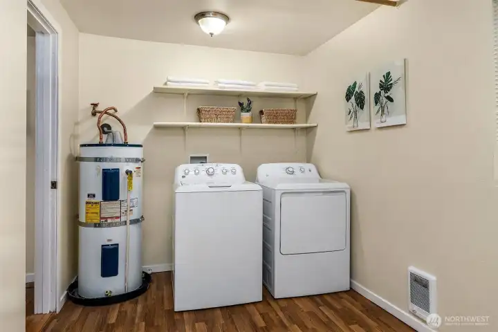Huge laundry room offers plenty of storage space.