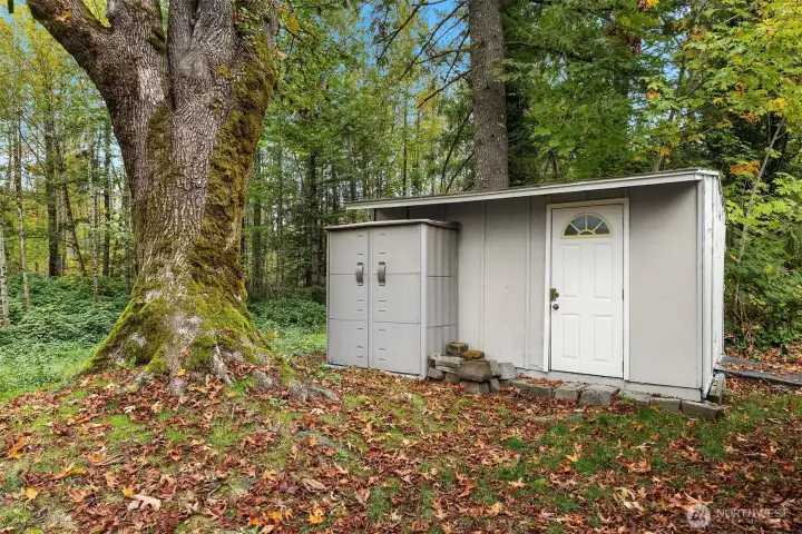 Outbuilding shed and additional storage.
