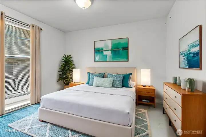 The front bedroom staged virtually.