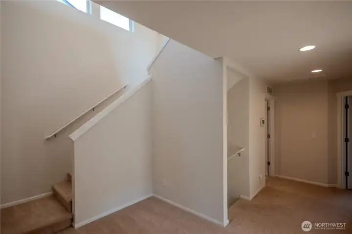 foyer with nice storage under the stairs