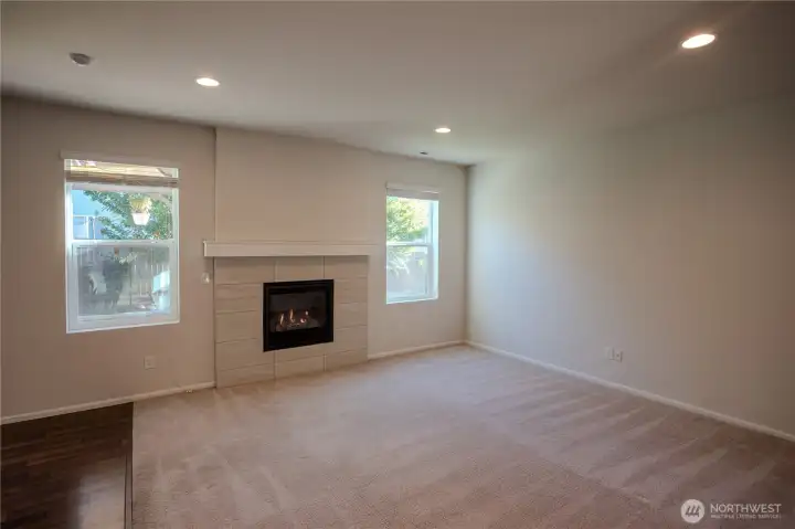 large living area with gas fireplace