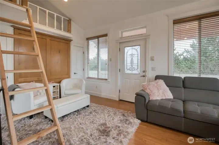 Use the first floor as all living space or utilize the murphy bed.  Currently set up for sleeping quarters in the loft.