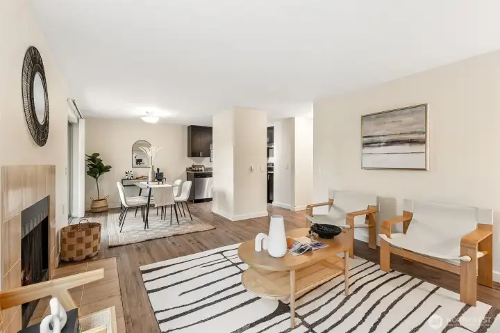 Seamless blend of living room with a clear dining room eating space.