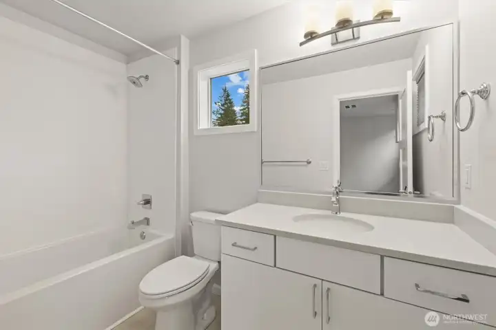 Ensuite bathroom to the second bedroom (virtually staged)