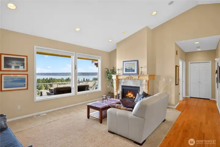 Hall leads to main floor primary suite, office and guest bathroom.