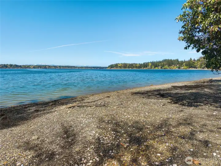 Olympic Mountain Views from the pebbly beach frontage offers wide-open views across Eld Inlet and the surrounding shoreline. Olympic Mountain Views from the pebbly beach frontage offers wide-open views across Eld Inlet and the surrounding shoreline.