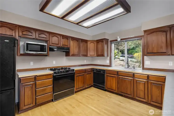 Spacious kitchen with abundant cabinetry, generous counters, and open sightlines. Spacious kitchen with abundant cabinetry, generous counters, and open sightlines.