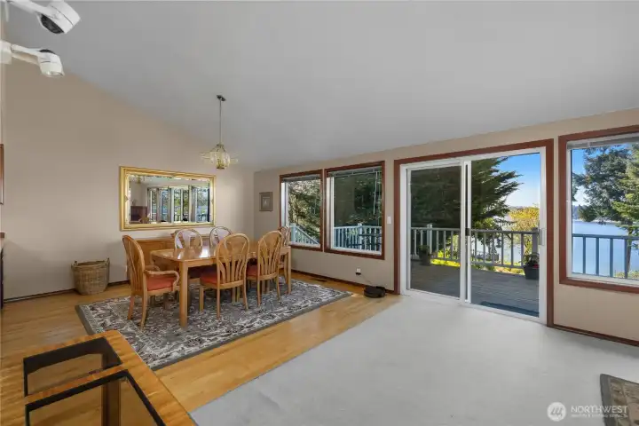 Dining and living room windows and sliding doors frame tranquil views of Eld Inlet. Dining and living room windows and sliding doors frame tranquil views of Eld Inlet.