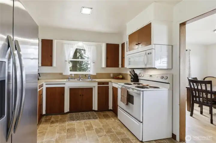 Kitchen has a couple storage closets.