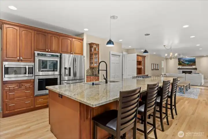Oversized kitchen island offers seating, prep space, and gathering room