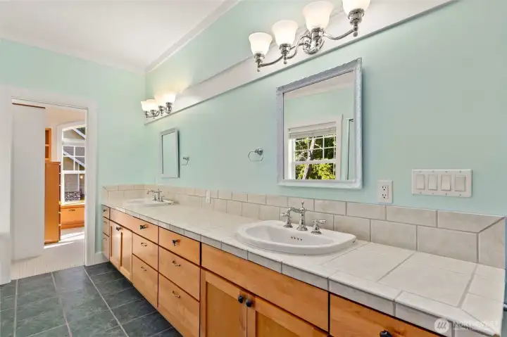 Primary bath opens to walk in closet area Primary bath opens to walk in closet area