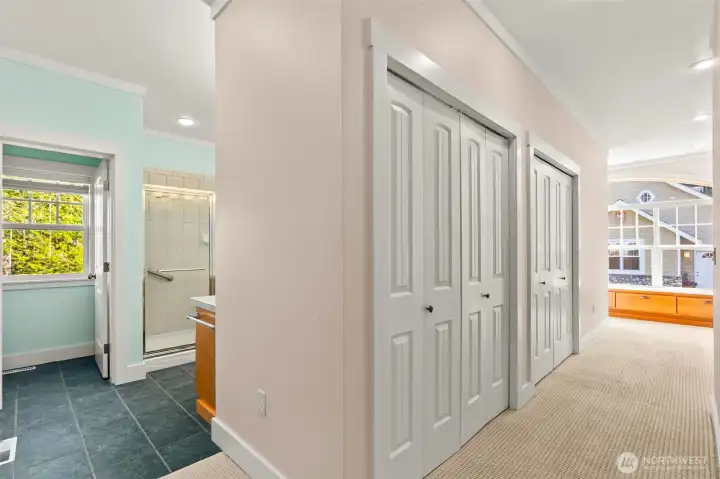 Primary bath and HUGE walk-in closet area w additional laundry for primary and more storage Primary bath and HUGE walk-in closet area w additional laundry for primary and more storage