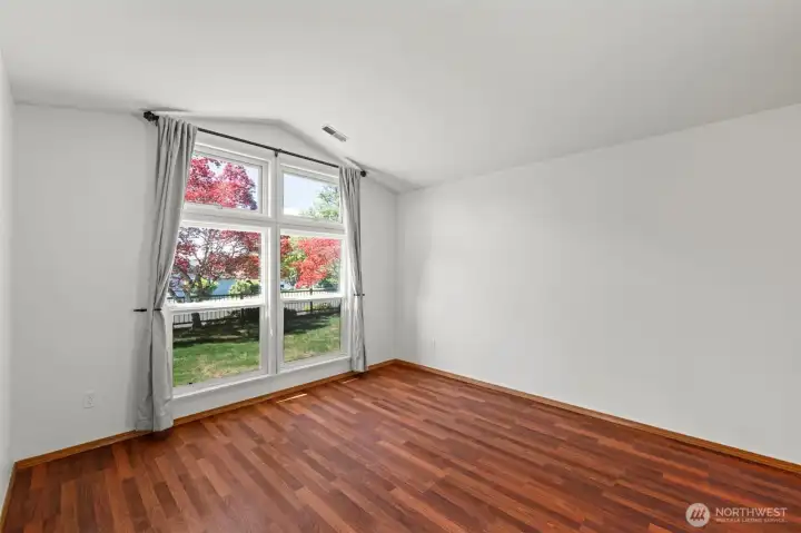 The Living room window overlooks the private front yard.