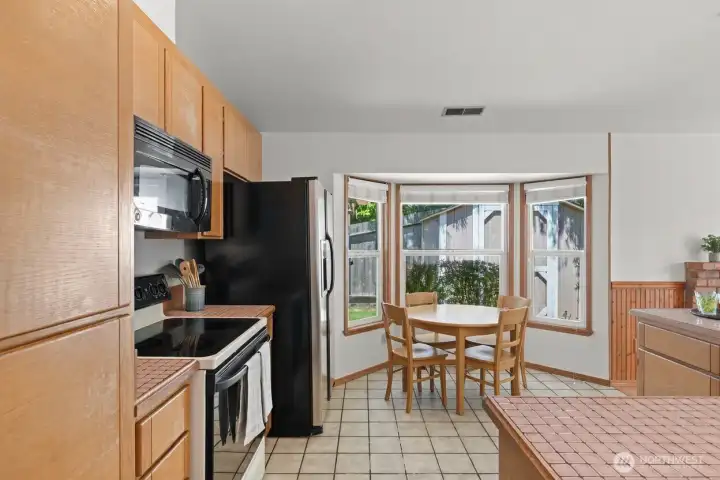 The nook features room for a breakfast table.