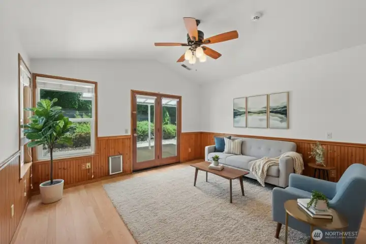 French doors open onto the covered patio. Another staged design.