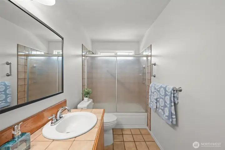 Glass tub/shower doors.