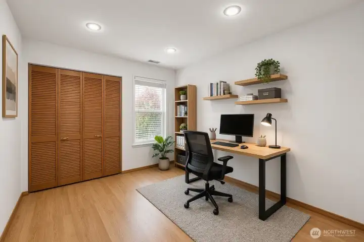 Bedroom 3 is virtually staged as an office.