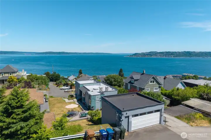 Check out that view! The garage is just above the studio apartment, Unit C. You can also see the parking pad for one car to the right of the garage.