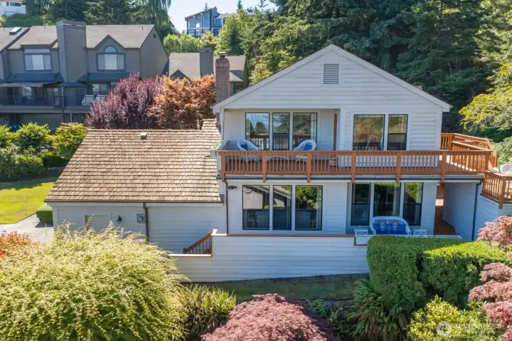 another view of home showing abundant deck space