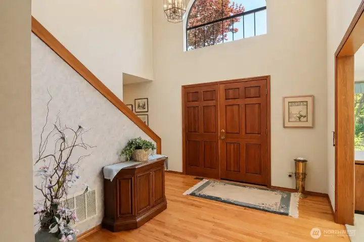 Beautiful foyer with gleaming hardwood floors