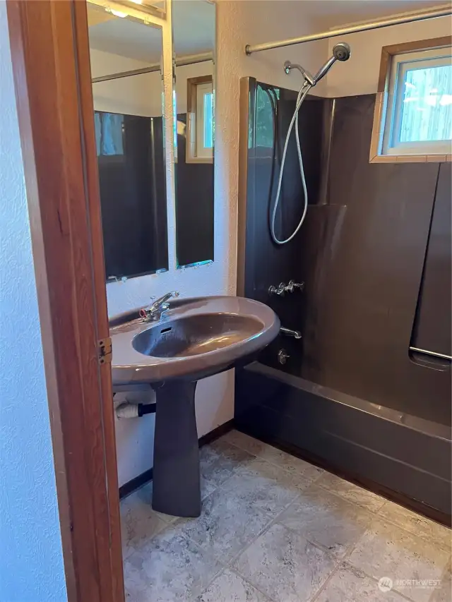 Including the full bath. Midcentury modern and new floor tile.