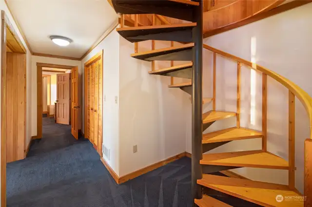 The lower level hallway with linen closets.