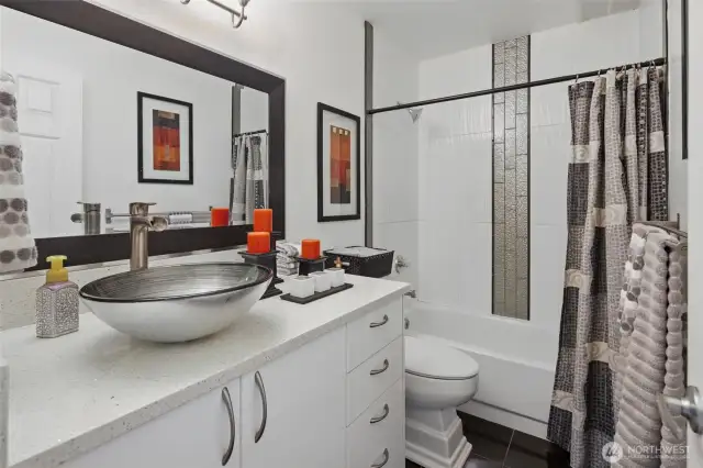 Bath #3 with stylish tile.