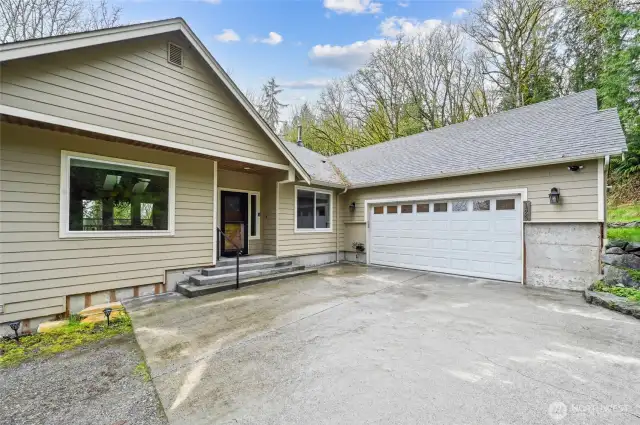Spacious Parking at front of house.  Pull into your garage and walk straight into the Kitchen area.