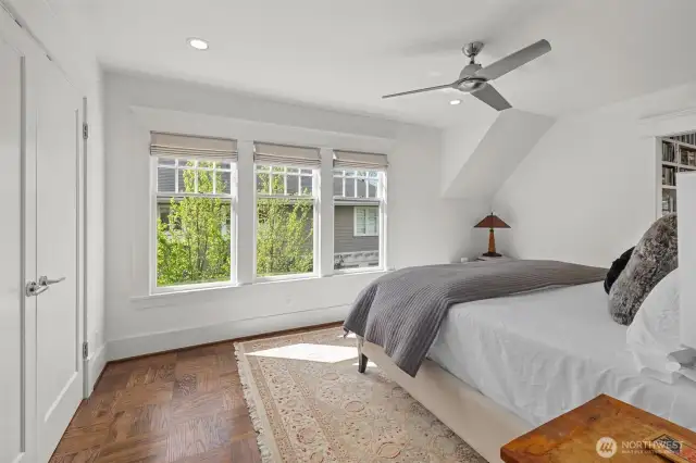 Primary bedroom with walk-in closet