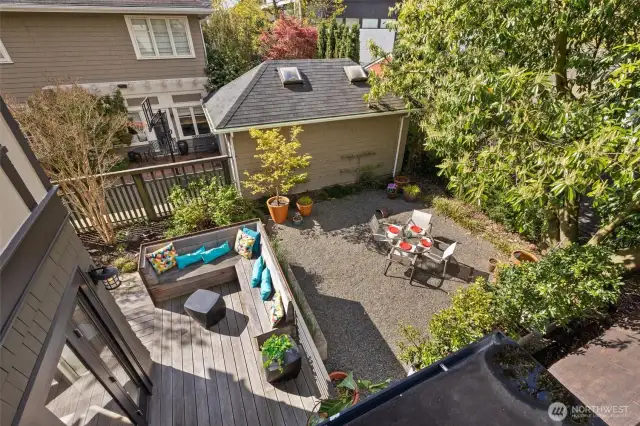 Outdoor area behind two car garage