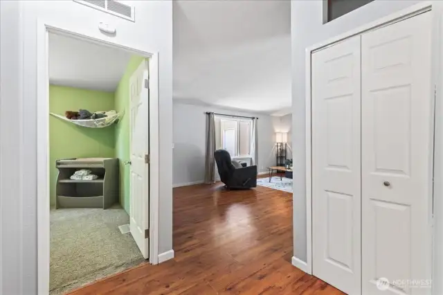 Hallway, bedroom on the left, linen closet on the right