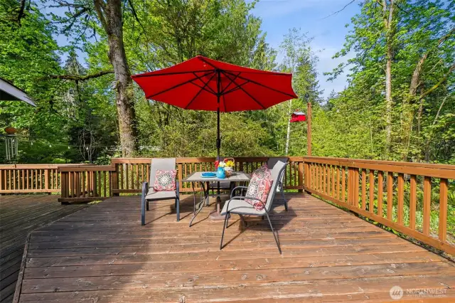 An upper platform area makes a great spot of outdoor dinning.  Take morning breakfast with the birds in this natural wonderland.