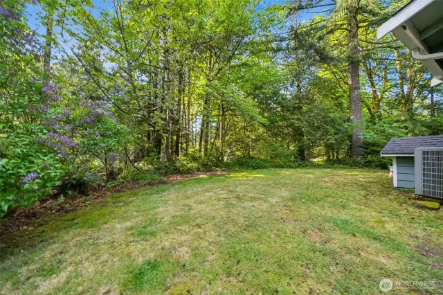 The level side lawn offers a kick-ball space, or place to run fido.  The energy efficient heat pump provides comfortable heating and cooling year round.  The home is wired for a generator .  Ventilated shed available.