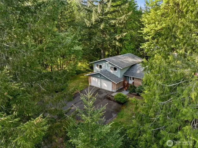 Come home to this woodland hide-away but still discover plenty of light.