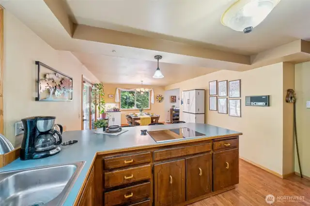 The easy and open kitchen location welcomes entertaining and daily interaction from the large flex/dinning space.