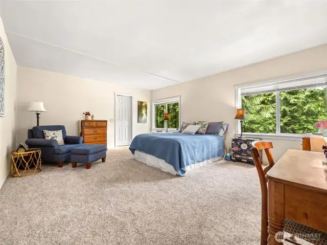 Huge Primary Suite with beautiful natural light streaming in.  Complete with private bath and walk-in closet.