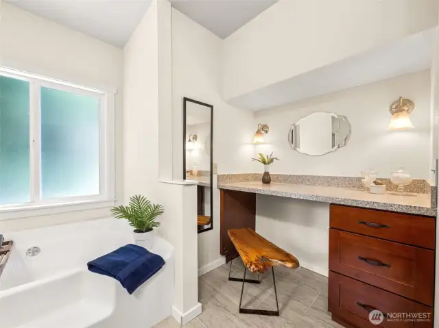 Primary Bath also has a wonderful built-in dressing table for your morning routine.