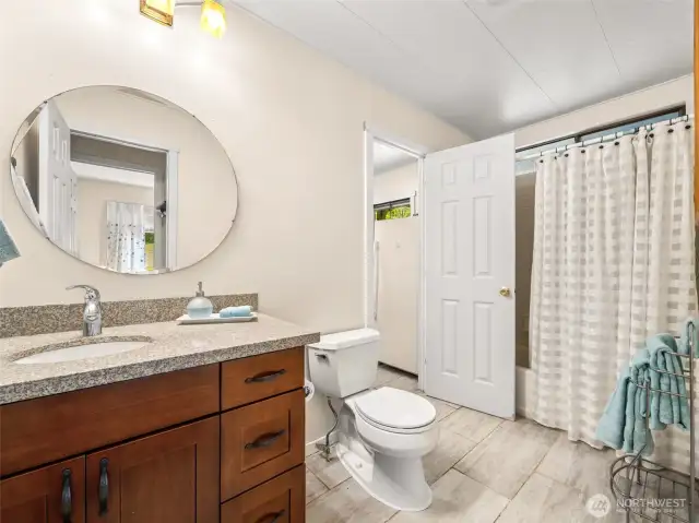 Additional Full Bath off Laundry Room/Carport Entry.