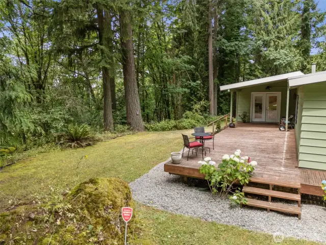 Good sized entertaining deck off the Living Room through the French Doors.  Beauty surrounds!