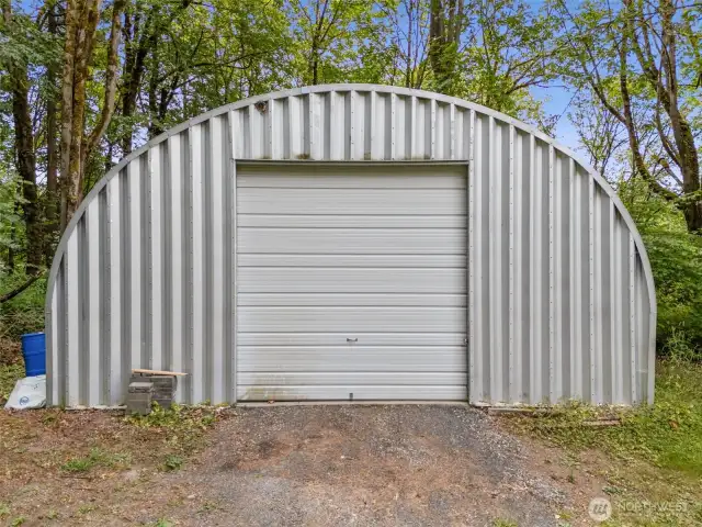 This detached garage/shop is 30'x32' and will house 3-4 cars.
