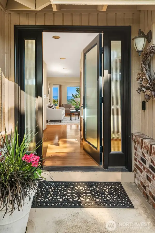Enter through the front door to take in the full beauty of the open floor plan and majestic view of the Cascades!