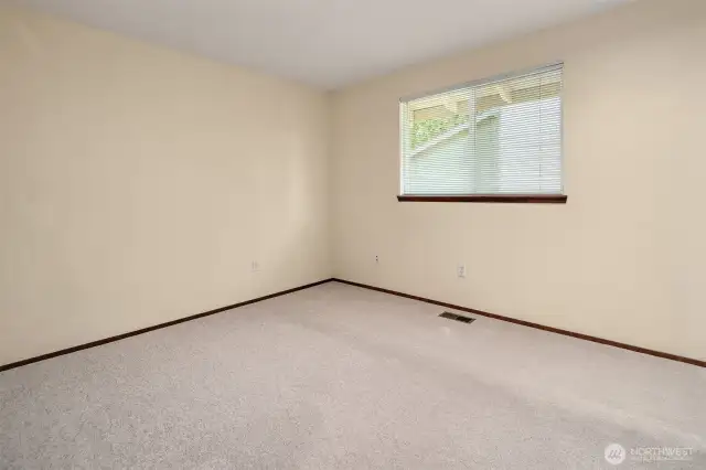 One of  two upstairs bedrooms with big closet.