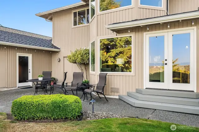 Patio is tucked in next to the home but opens up to private backyard with views of the foothills.
