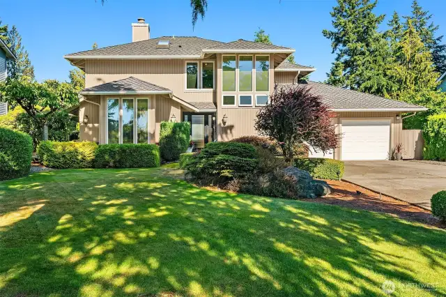 The spacious front yard with mature trees and shrubs creates privacy from other homes in the neighborhood.  A drip irrigation system and sprinkler system keeps everything looking great!