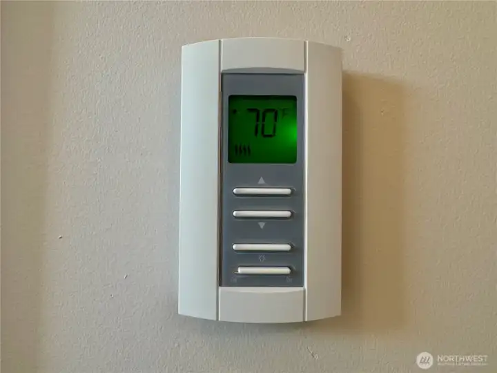 Both bathrooms have heated tile flooring